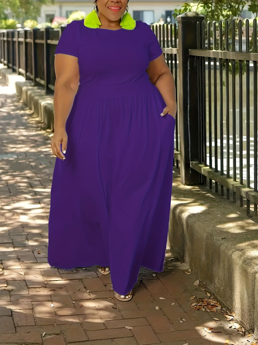 Vacation-ready women's plus size flowy short sleeve maxi dress, elegant and relaxed.