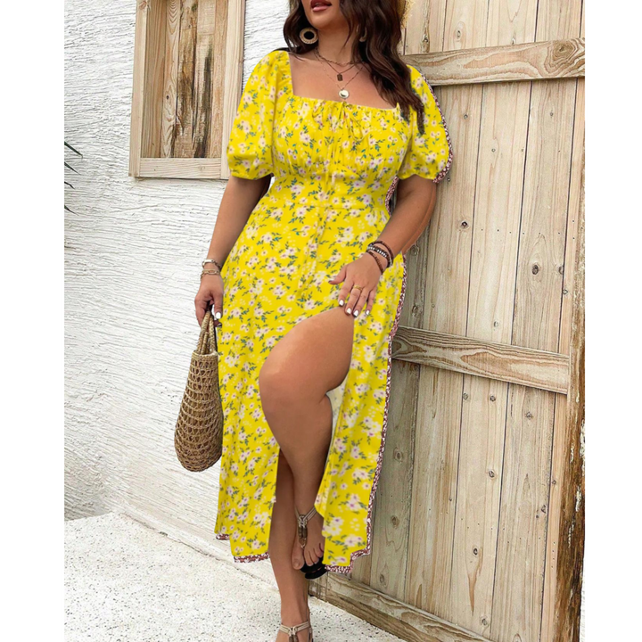 Women's plus size maxi dress with elegant puff sleeves and a flowing silhouette.