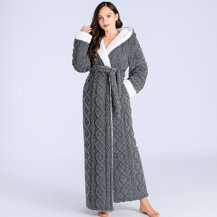 Soft women's plush hooded full-length robe, perfect for cozy comfort & home relaxation. Ideal winter loungewear.