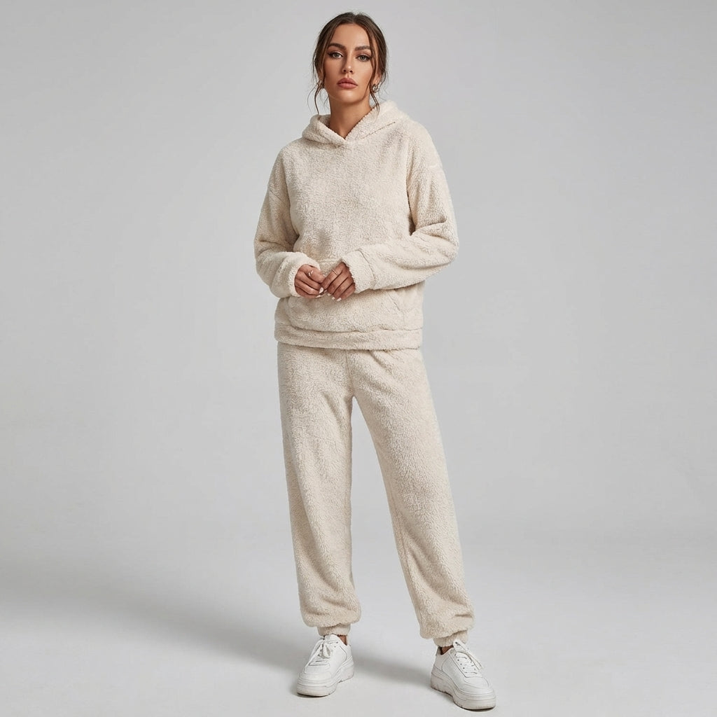 Women's plush loungewear set: ultimate comfort hoodie and pants. Cozy two-piece matching outfit for relaxation.