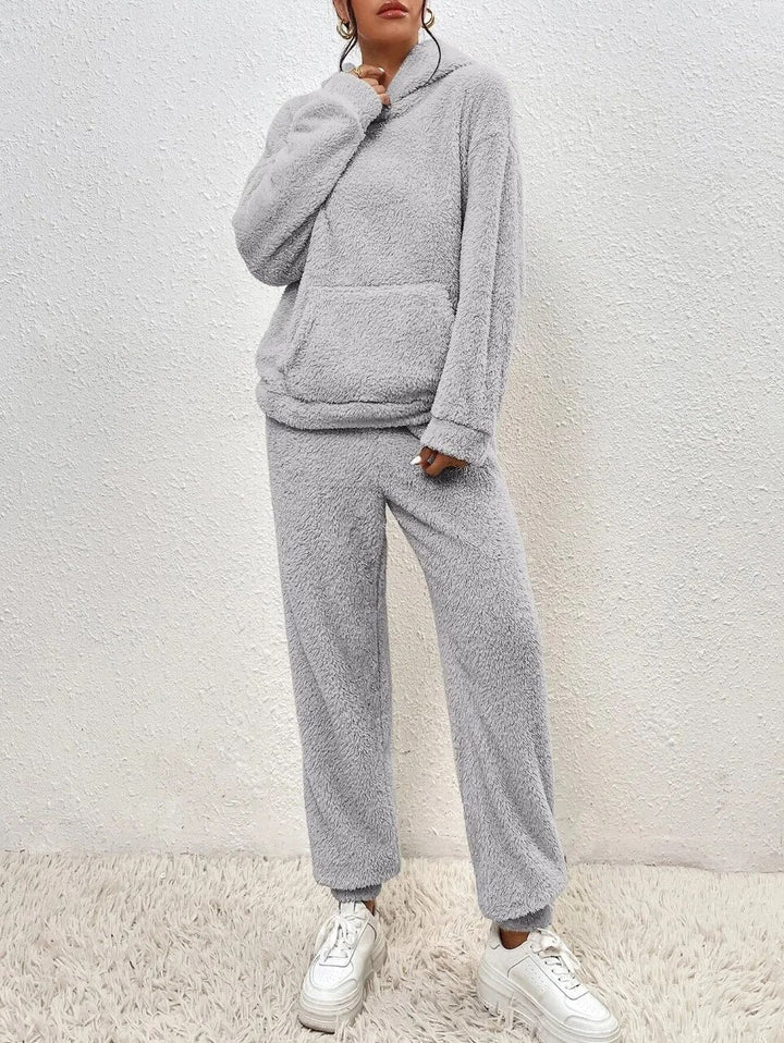 Side view of women's plush loungewear set, featuring a comfortable hoodie and soft matching pants.