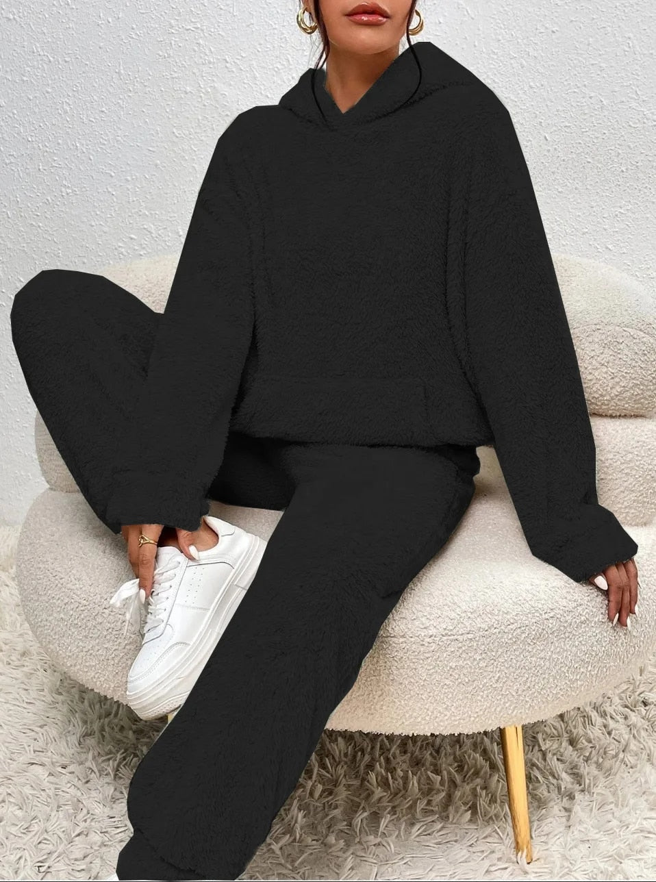 Women's cozy set: plush hoodie & pants, perfect for home attire. Relaxation outfit, a winter essential.