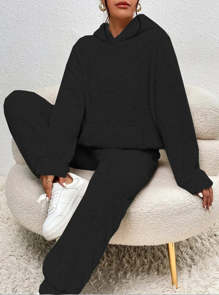 Women's cozy set: plush hoodie & pants, perfect for home attire. Relaxation outfit, a winter essential.