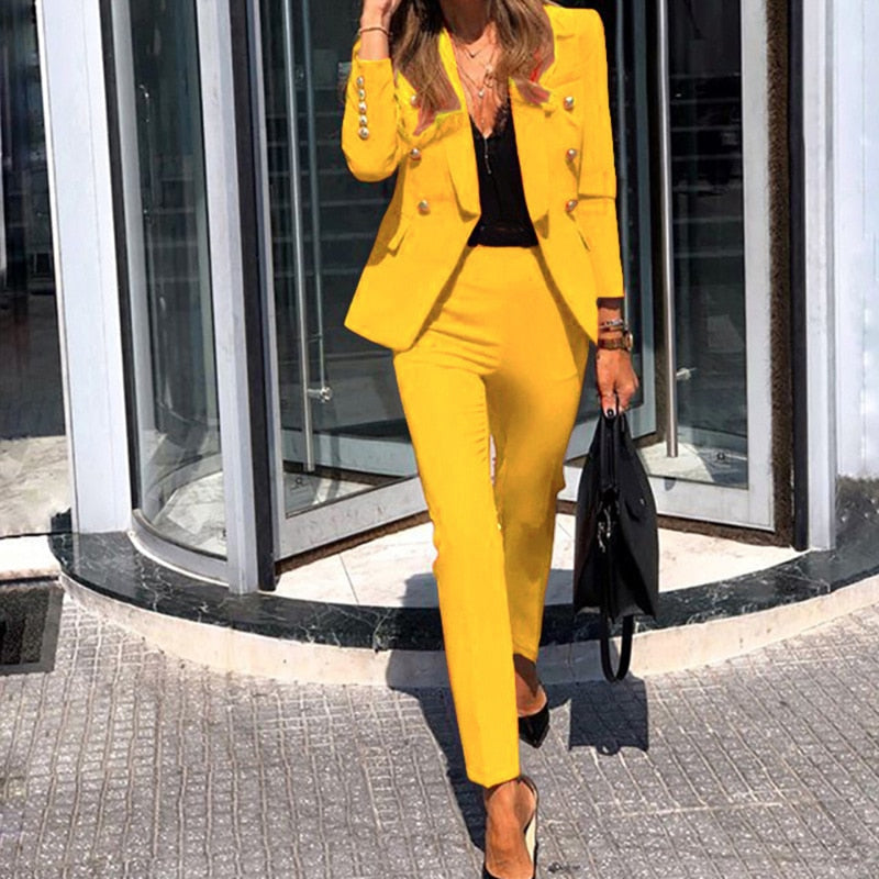 Women's polished double-breasted blazer and tailored pants suit set, ideal for professional office wear & business.