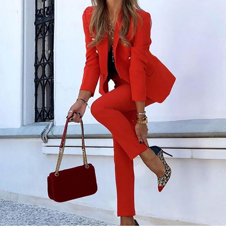 Elegant women's double-breasted blazer & tailored pants suit set, perfect for business meetings & professional attire.