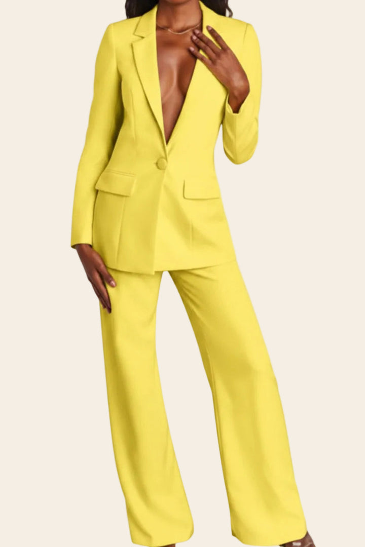 Detailed shot of the tailored fit of a women's professional suit set, emphasizing its chic and elegant design.