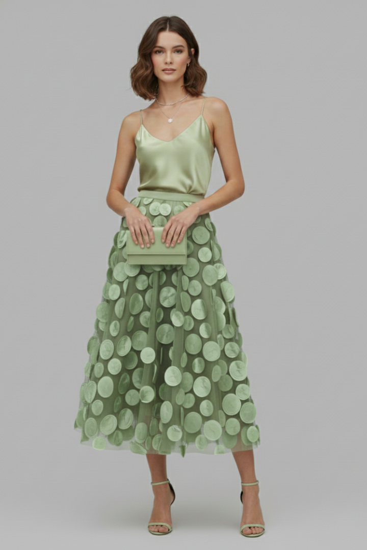 Layered, flowy polka dot full skirt for women. Elastic waist ensures comfort for summer parties & elegant looks.