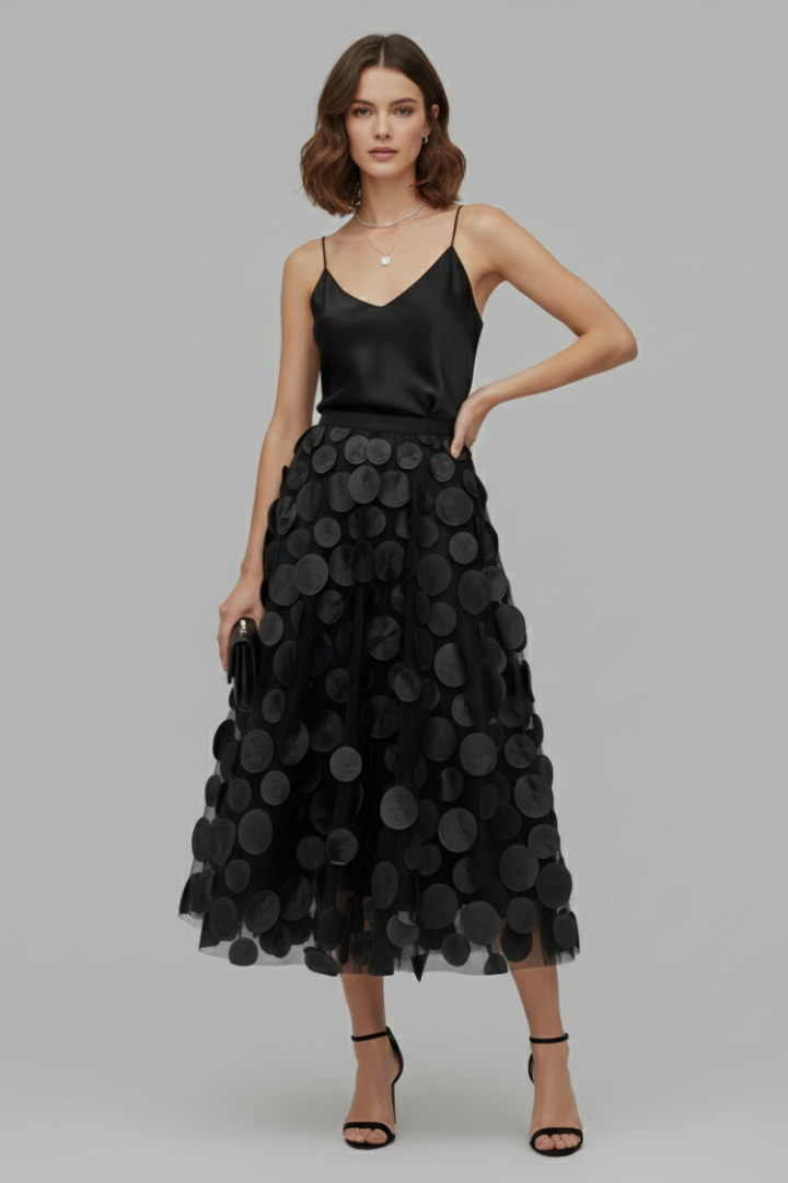 Elegant women's polka dot full skirt, perfect for party or evening wear. Features a layered, flowy design.