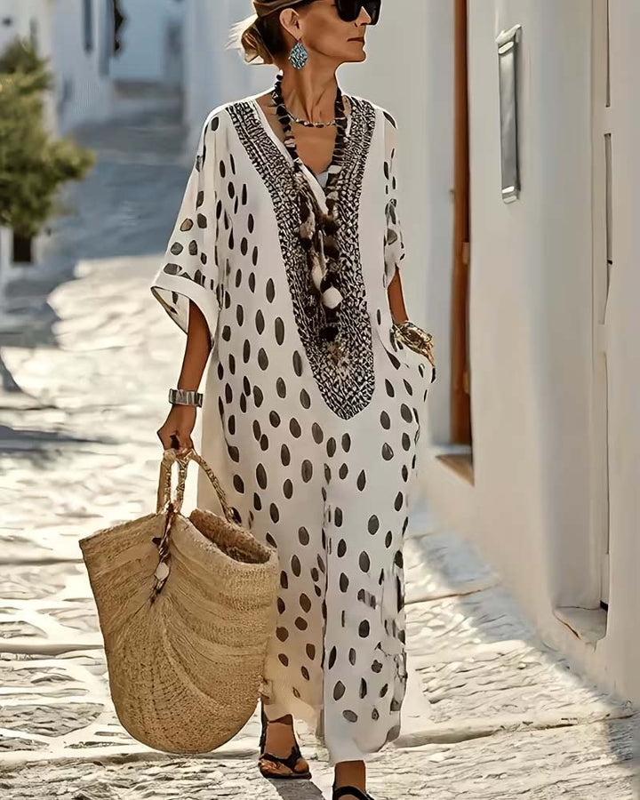 Chic women's Polka Dot Maxi Kaftan Dress, a versatile V-neck summer dress for vacation or casual wear.