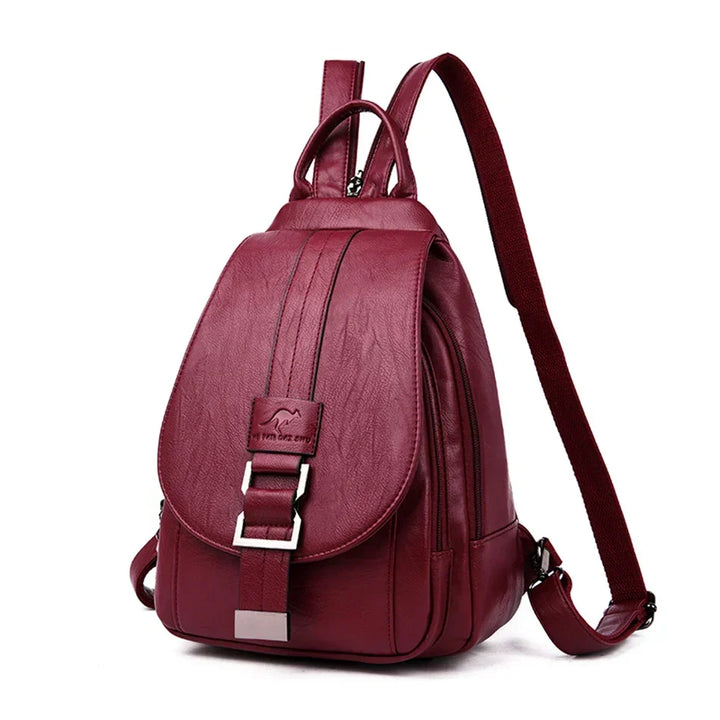 Women's premium black leather backpack, water-resistant for everyday carry & travel.