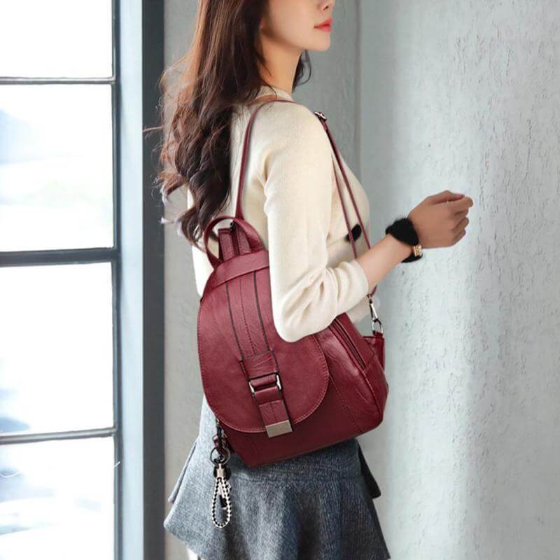Commuter-friendly women's leather backpack, water-resistant, made with premium leather.