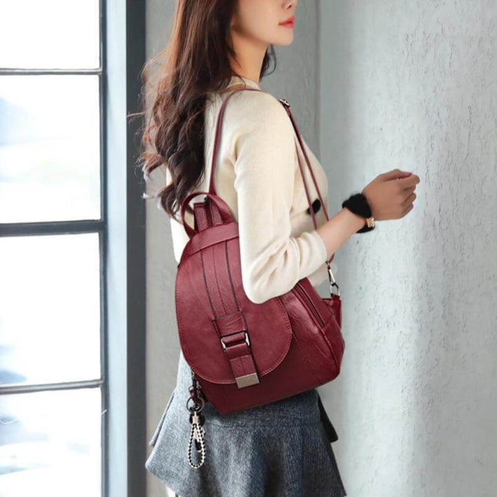 Commuter-friendly women's leather backpack, water-resistant, made with premium leather.