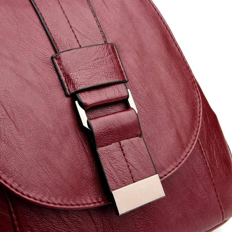 Sophisticated women's premium leather backpack, water-resistant, ideal for organized travel.
