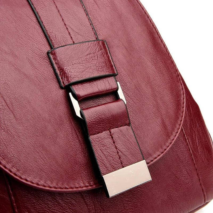 Sophisticated women's premium leather backpack, water-resistant, ideal for organized travel.