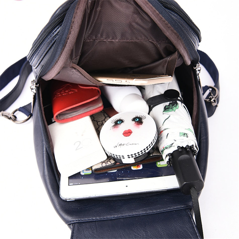 Sleek women's premium leather backpack, water-resistant, perfect for stylish travel.