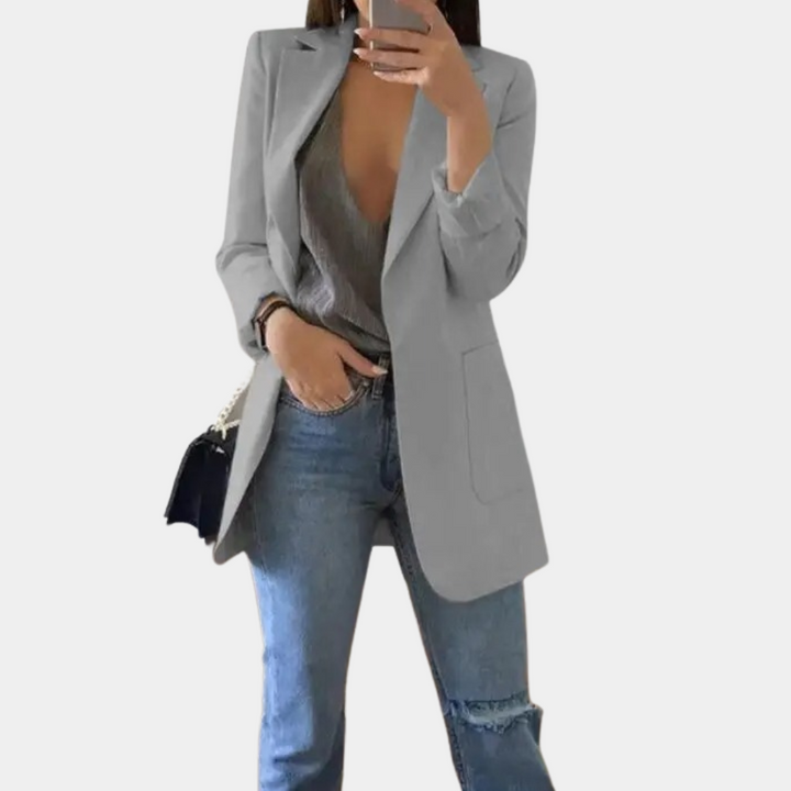 Stylish women's long tailored blazer, a versatile jacket for formal, casual, and office fashion trends.