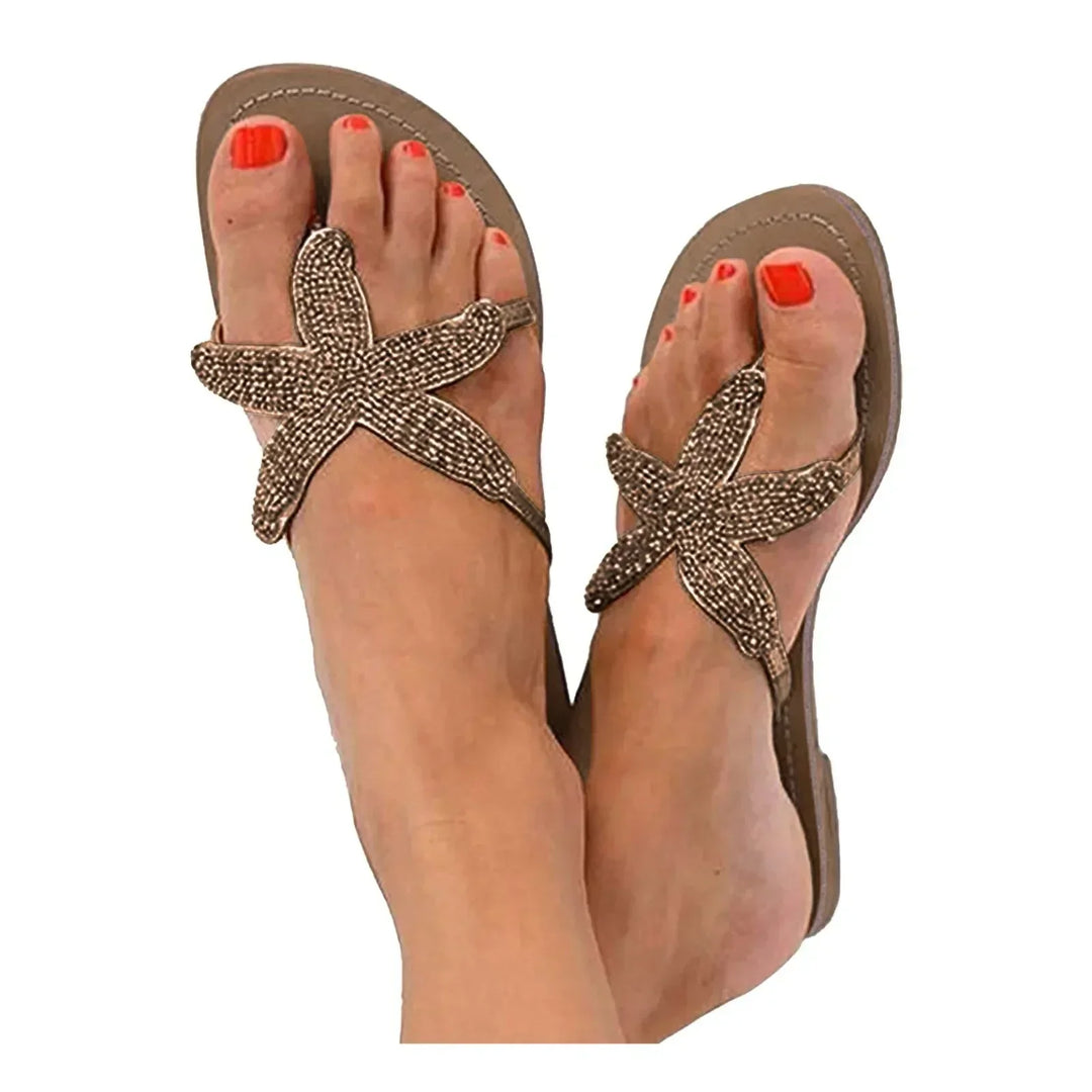 Women's open-toe flat slide sandals, offering comfortable and chic casual style for daily wear.