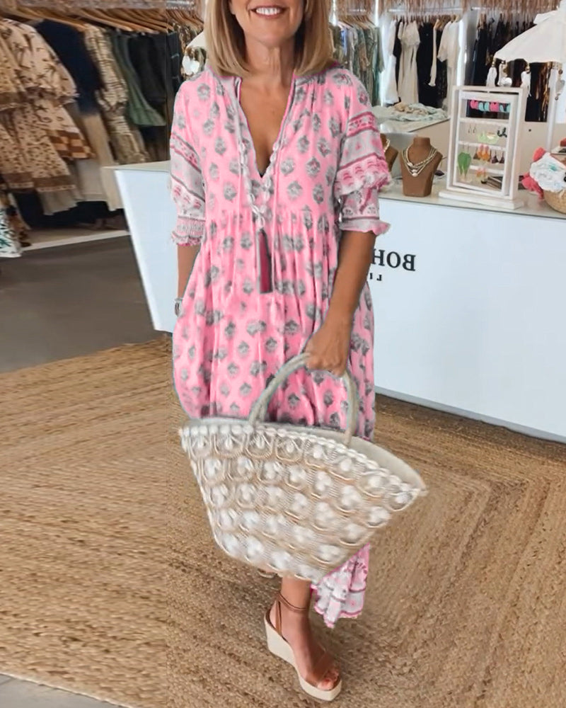 Detailed print bohemian midi dress for women, with flattering V-neck and distinct lantern sleeves.