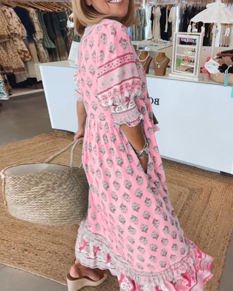 Women's printed bohemian midi dress with lantern sleeves, V-neck, and a comfortable flowy fit.