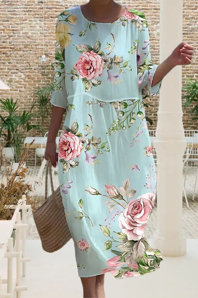 Comfortable women's printed midi dress, relaxed silhouette. Versatile for effortless summer style & casual fashion.