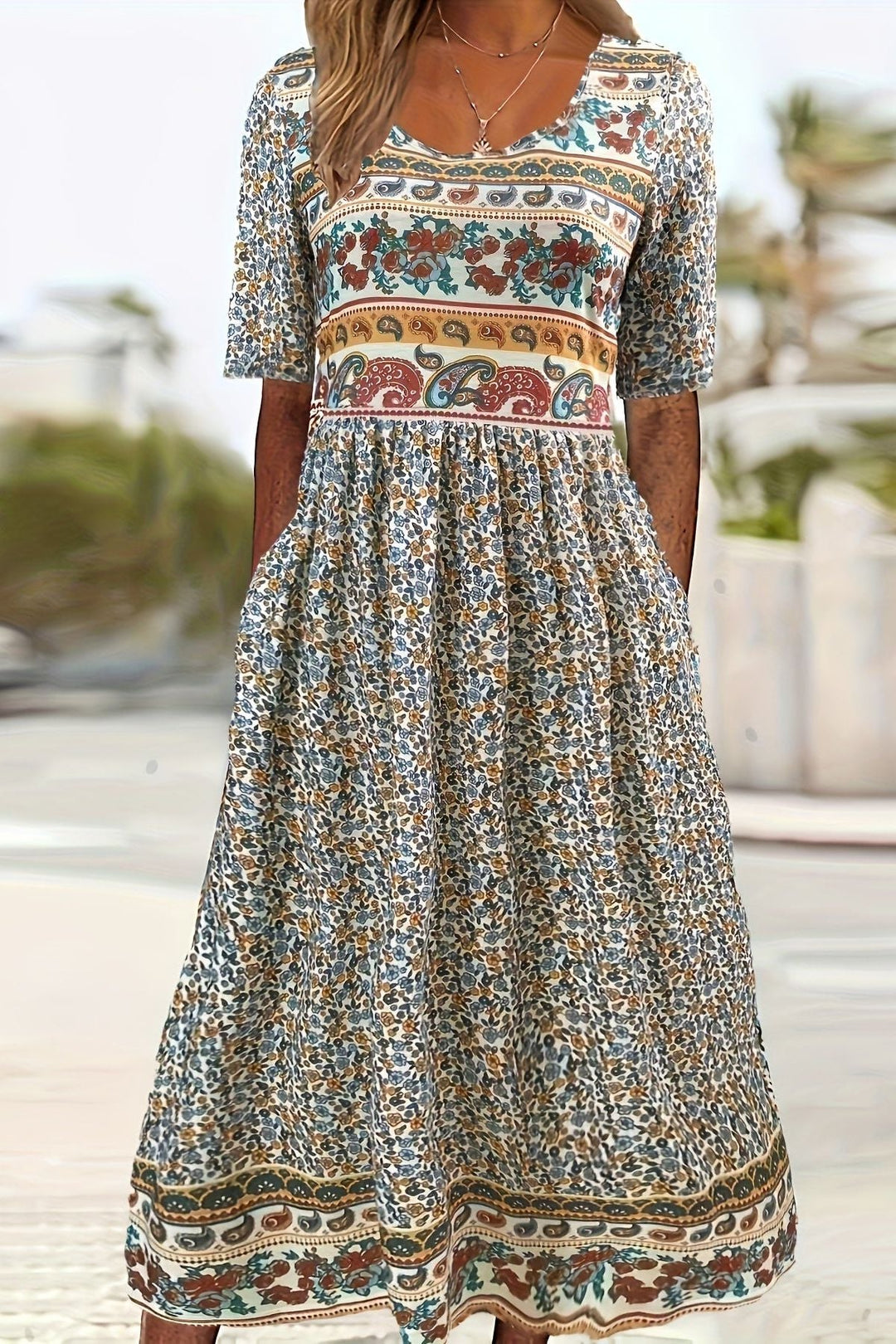 Women's printed relaxed midi dress, perfect for effortless summer style and everyday casual wear.