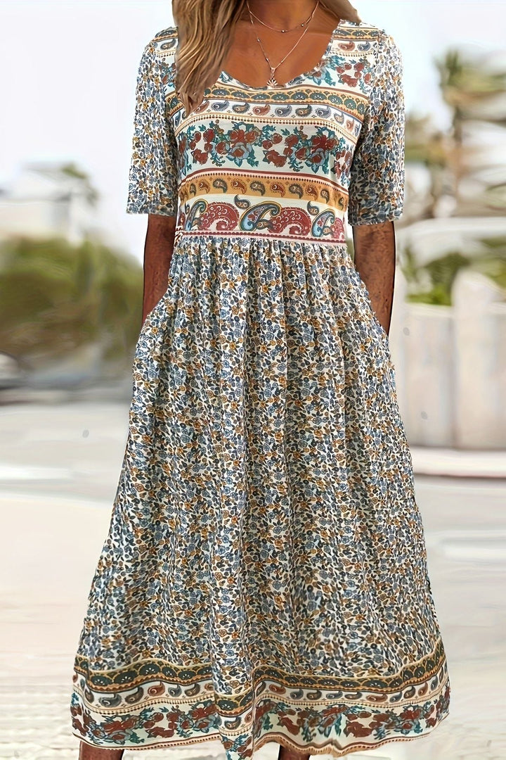 Women's printed relaxed midi dress, perfect for effortless summer style and everyday casual wear.