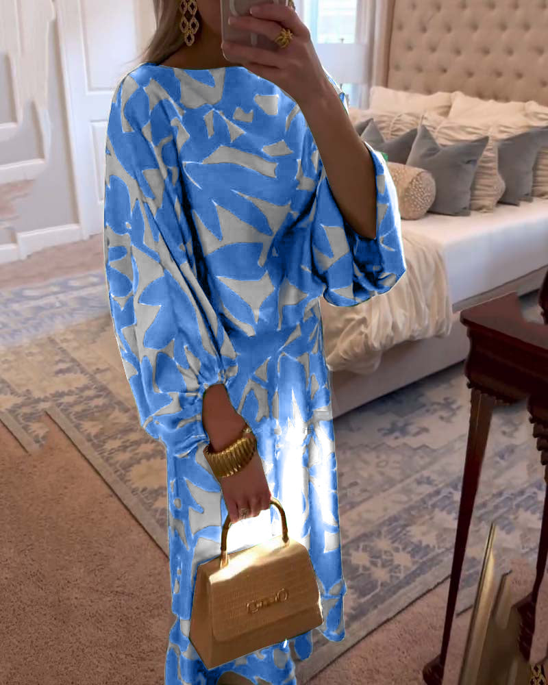 Women's printed matching set, showcasing the elegant drape of lantern sleeves and flowy skirt.