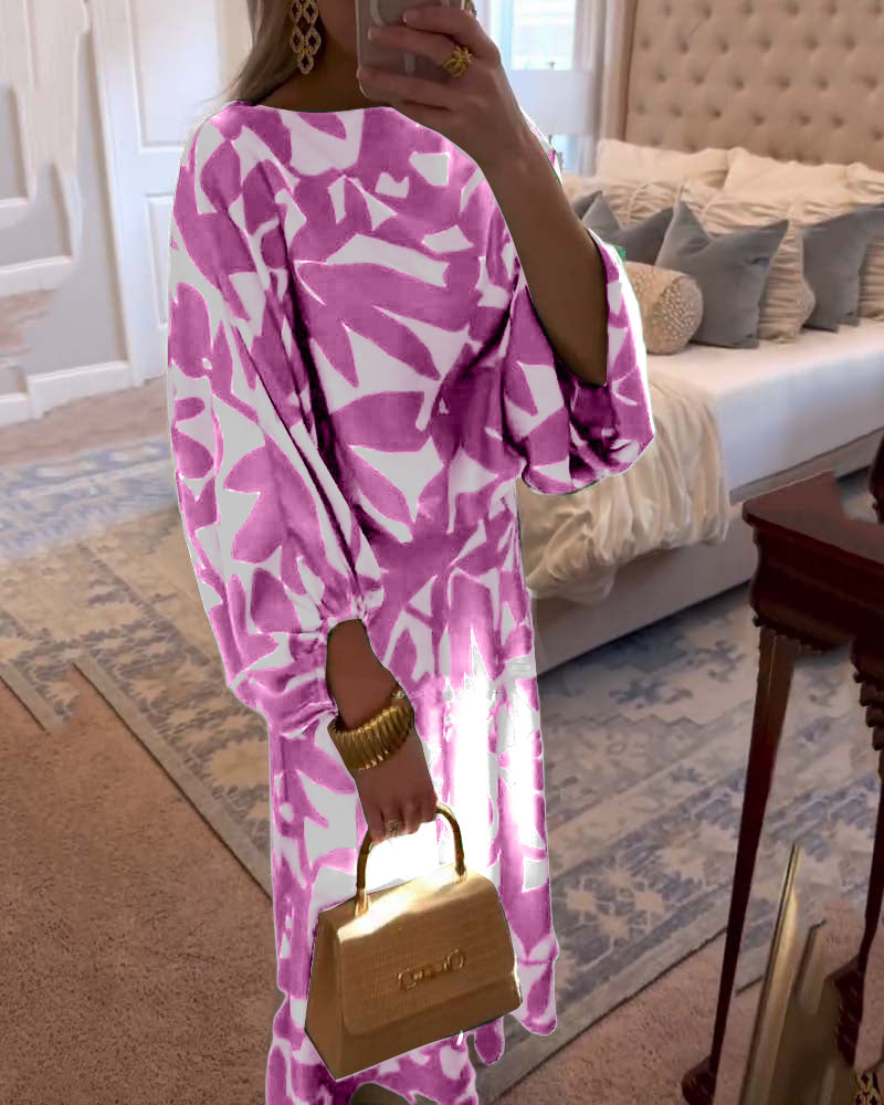 Model wearing women's printed two-piece set with elegant lantern sleeves, styled for a chic day look.