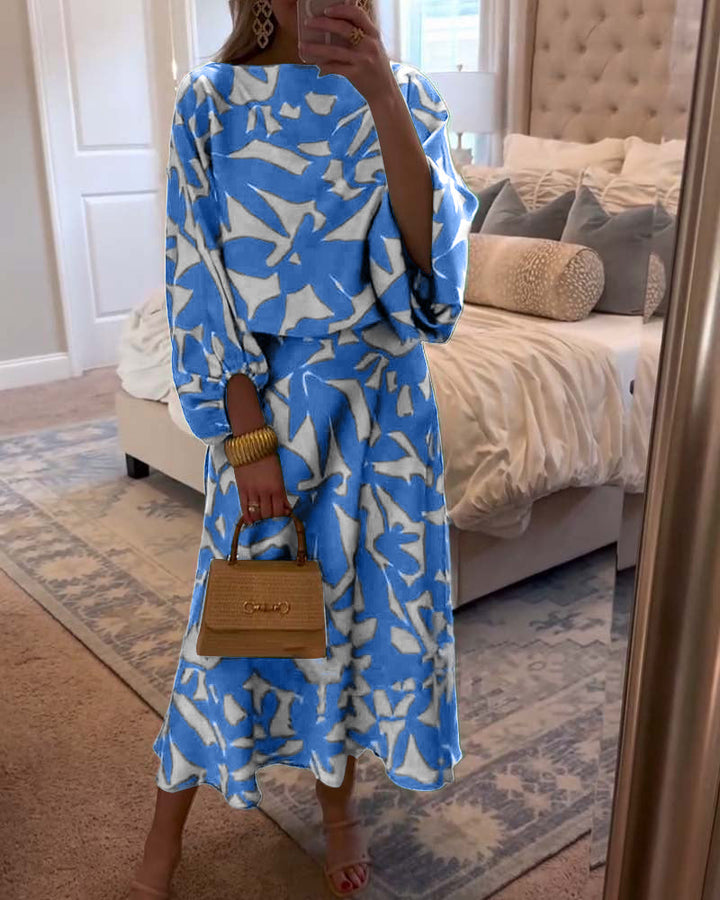 Chic women's matching set: printed top with long lantern sleeves & coordinating skirt.