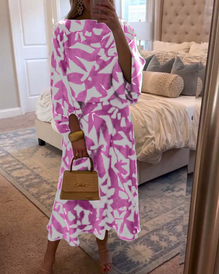Versatile women's printed two-piece outfit; elegant lantern sleeve top & matching skirt.