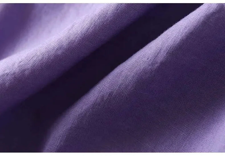 Women's purple patterned V-neck blouse, relaxed fit, elegant embroidery.