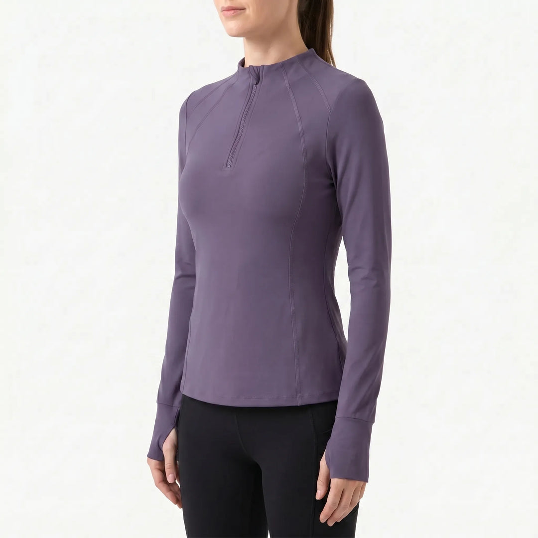 Women's quarter-zip running top with moisture-wicking fabric, great long sleeve for active lifestyles.