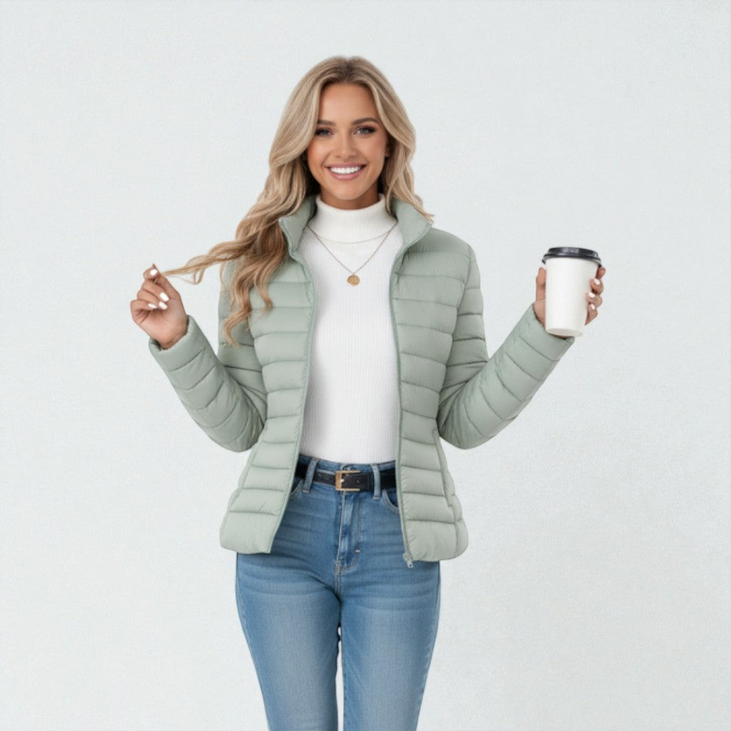 Casual women's quilted jacket with stand collar and full zip, great for lightweight fall outerwear.