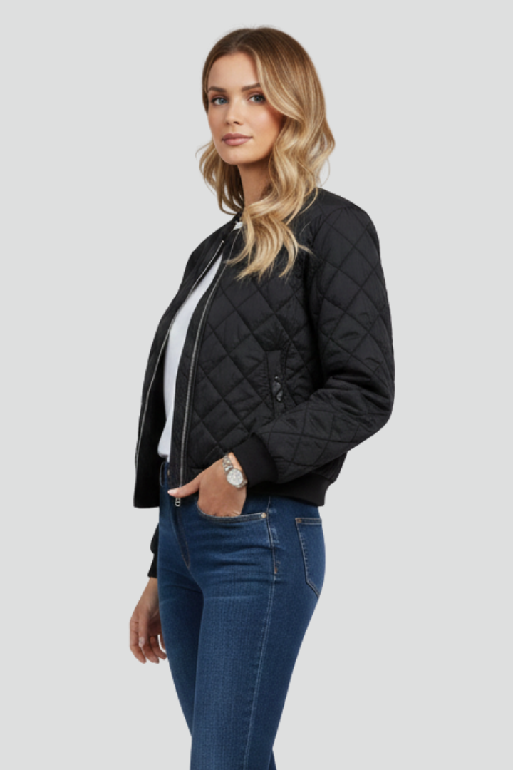 Relaxed fit women's quilted jacket, a cozy zip-up layering piece for comfortable fall fashion and transitional style.