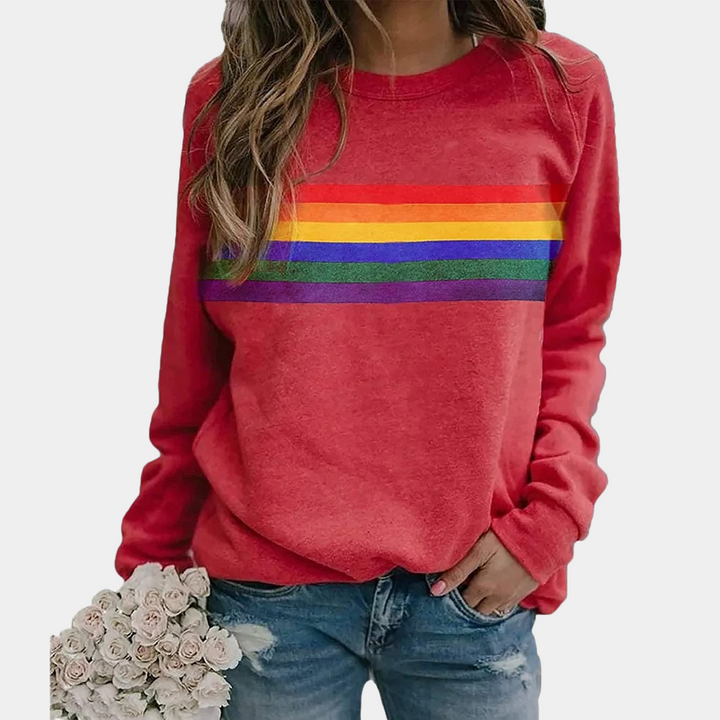Comfortable women's rainbow stripe sweatshirt, a stylish crewneck pullover with vibrant colors for casual wear.