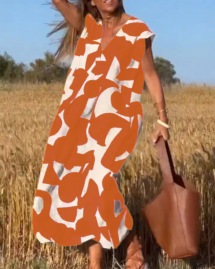 Women's V-neck abstract print casual dress, relaxed fit, suitable for everyday summer comfort.