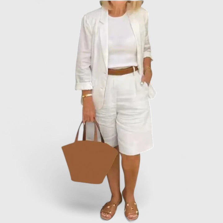 Chic women's relaxed fit blazer & Bermuda shorts set. Tailored resort wear, perfect for elegant vacation style.