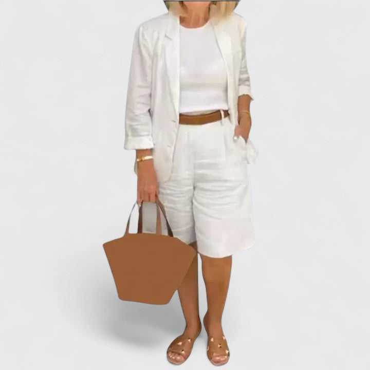 Modern women's relaxed blazer & Bermuda shorts ensemble. Sophisticated two-piece set for smart casual summer wear.
