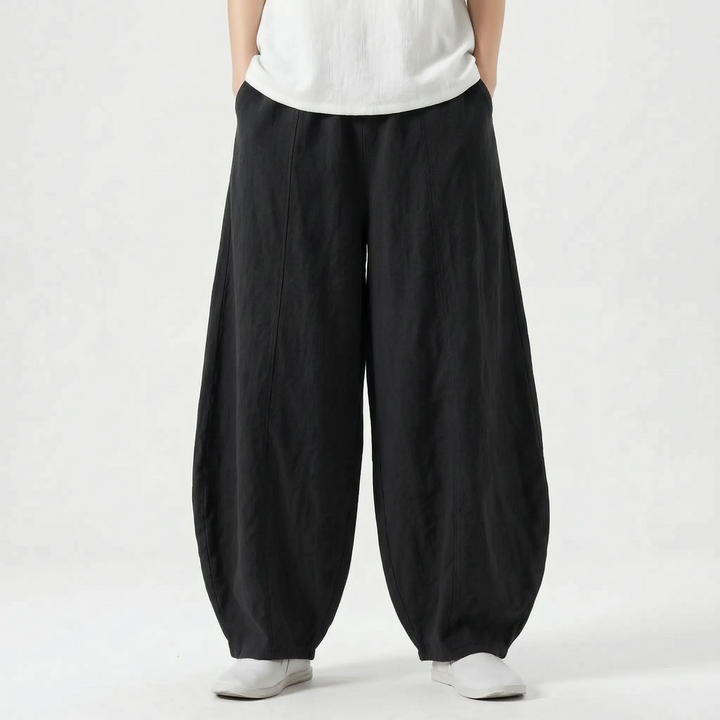 Chic women's barrel pants with a loose, relaxed fit and a fashionable wide leg, perfect for casual occasions.