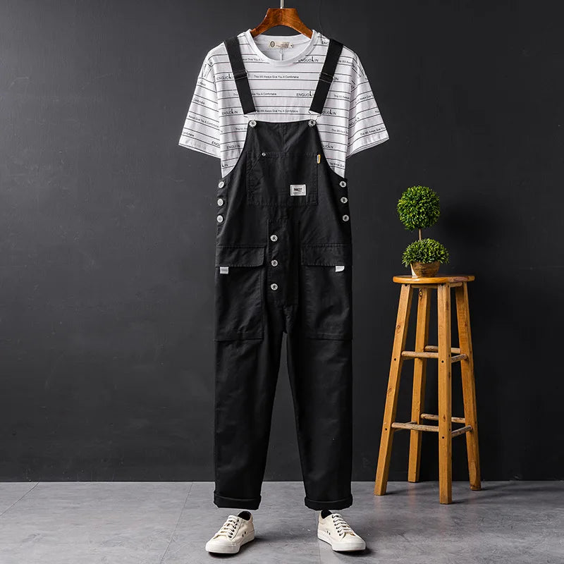 Classic women's relaxed fit bib overalls with adjustable straps & patch pockets.