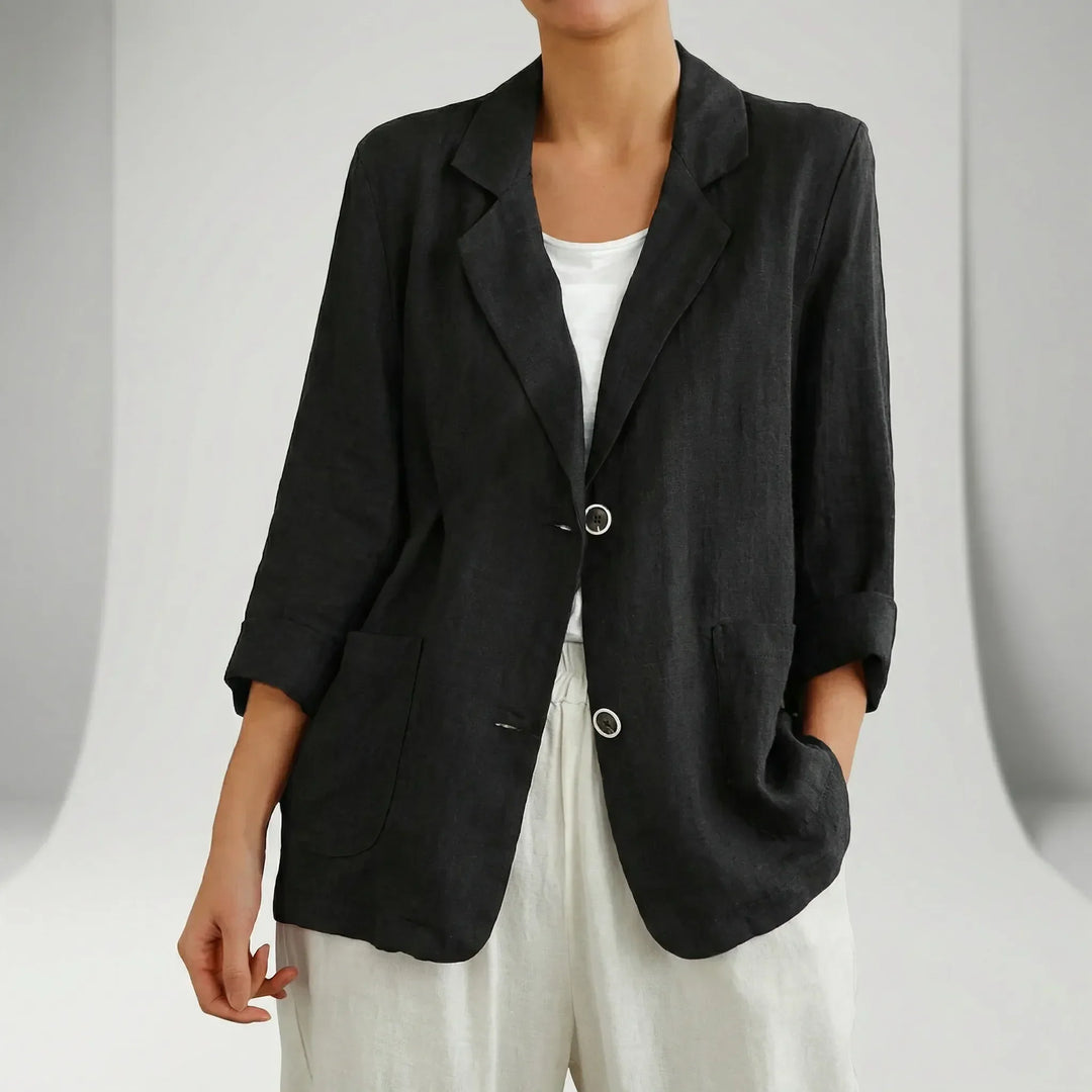 Relaxed fit women's blazer, a chic and professional jacket for effortless style in office or casual settings.