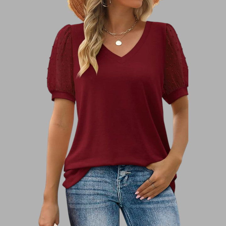 Versatile women's fashion blouse, relaxed fit, ideal for casual everyday style & comfort.