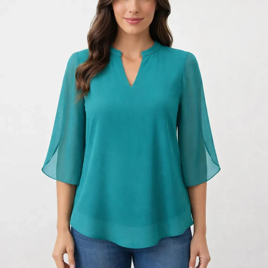 Stylish women's relaxed fit blouse, versatile for everyday wear, casual, or dressing up for chic events.