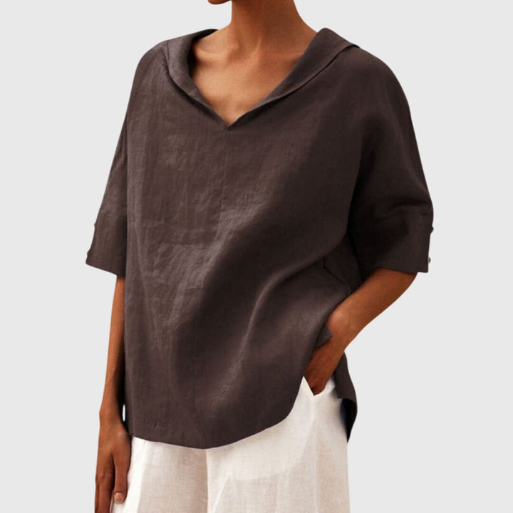 Woman wearing a relaxed fit blouse, showcasing its comfortable & chic casual style for everyday.