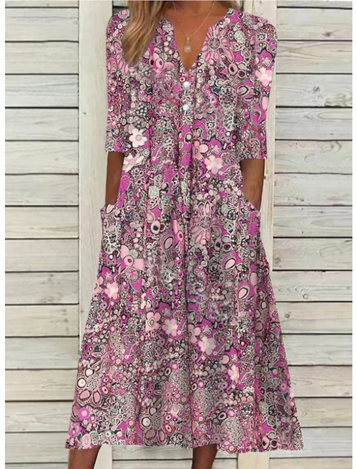 Stylish women's bohemian floral midi dress with relaxed fit, V-neck & half sleeves. Great for summer & casual wear.