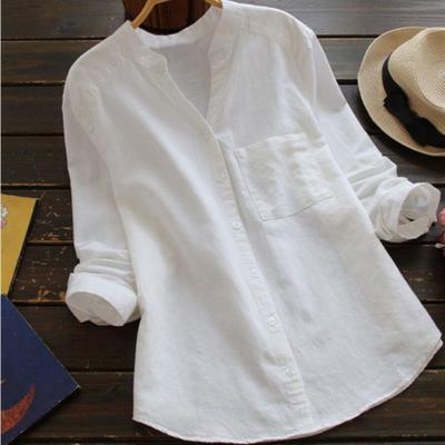 Woman wearing a relaxed fit breathable casual blouse, showcasing comfortable everyday spring fashion.