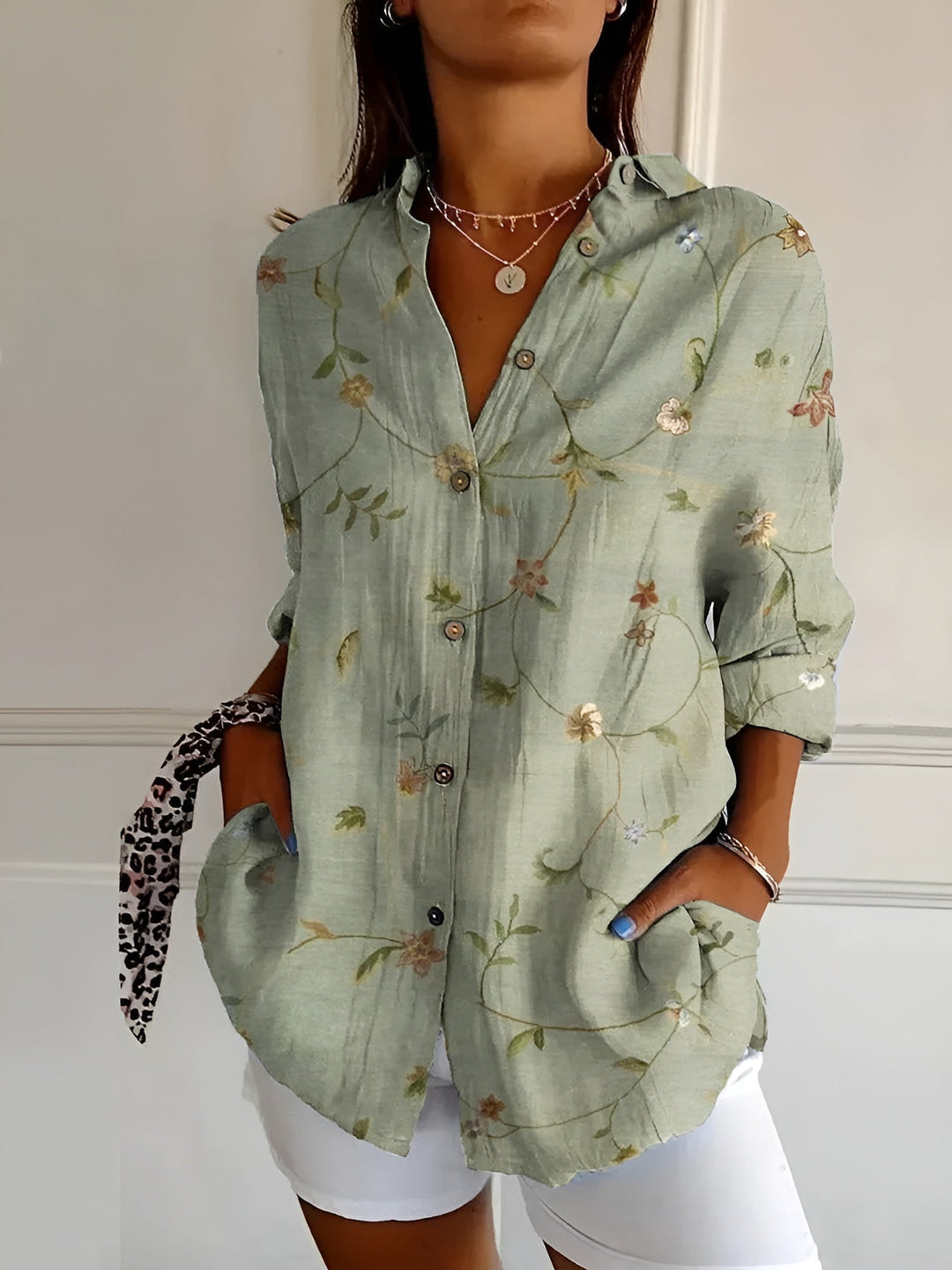 Women's relaxed fit button-down blouse, long sleeve, V-neck, perfect for work or casual everyday wear.