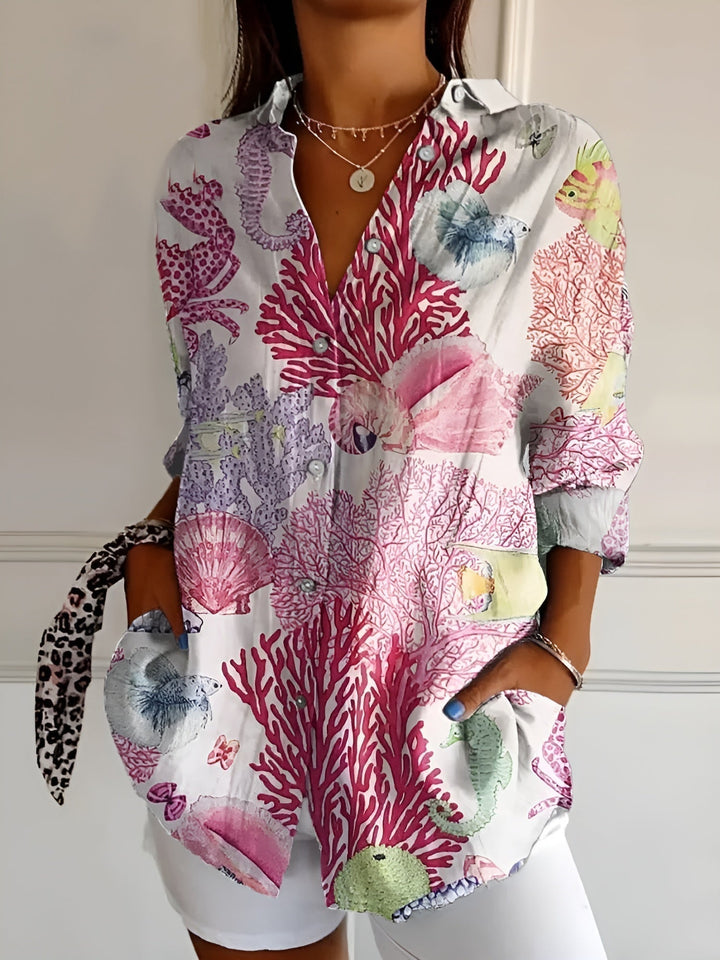 Relaxed fit women's button-down blouse, long sleeve V-neck, a comfortable and stylish top for spring or fall.