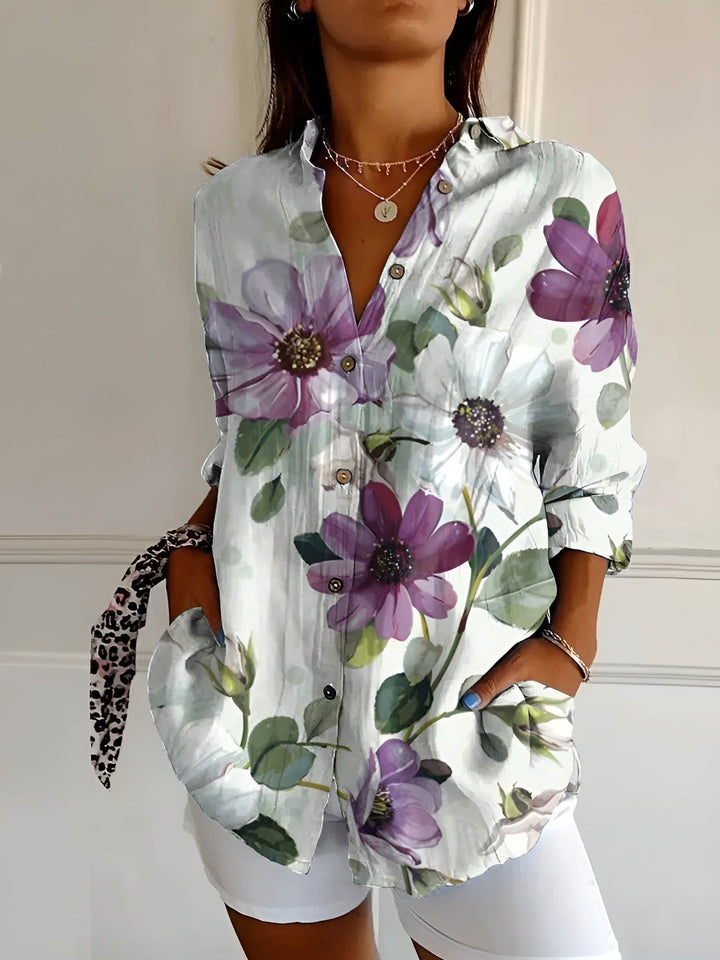 Elegant women's relaxed fit button-down blouse, long sleeve, V-neck, offering a stylish and comfortable silhouette.