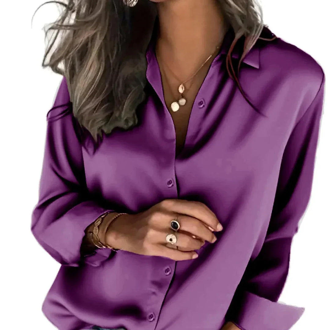 Women's relaxed fit button down shirt, perfect for effortless everyday style and comfort.